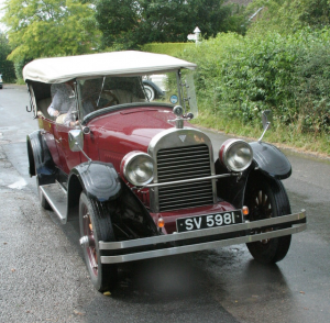 Visitors ride between the gardens in cars provided by Vintage Wheels